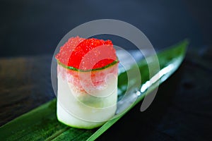 Tobiko caviar topped sushi roll with cream cheese