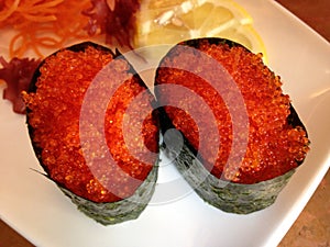 Tobiko (Flying Fish / Exocoetidae Roe) Sushi on Plate.