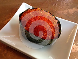 Tobiko (Flying Fish / Exocoetidae Roe) Sushi on Plate.