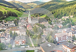 Toblach, Italy. Aerial view of Dobbiaco city and surrounding countryside in summer season photo
