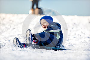 Tobogganing in deep snow photo