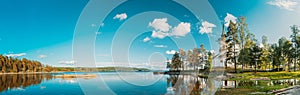 Tocksfors, Sweden. Old White Stommen Church In Sunny Summer Day. Local Landmark. Panorama