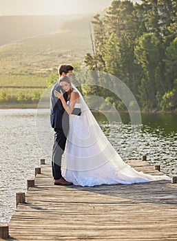 Today is a dream come true. Full length shot of an affectionate bride and groom outside on their wedding day.