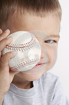 Toddler with Baseball