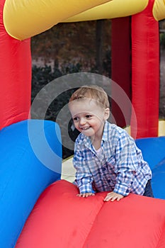 Toddler Boy in Bounce House