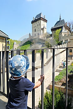 Toddler boy on Castle Karlstejn in Czech Republic