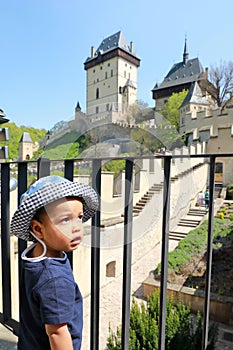 Toddler boy on Castle Karlstejn in Czech Republic