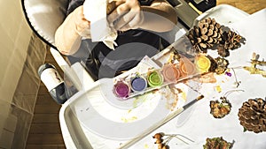 Toddler boy is cleaning table photo