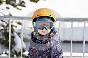 Toddler Boy Dressed Warmly & in Good Safety Gear Ready to go Ski