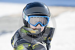 Toddler Boy Dressed Warmly & in Good Safety Gear Ready to go Sking