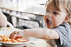 Toddler Boy Eating Pasta