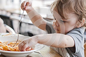 Toddler Boy Eating Pasta