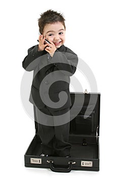 Toddler Boy in Suit Standing in Briefcase