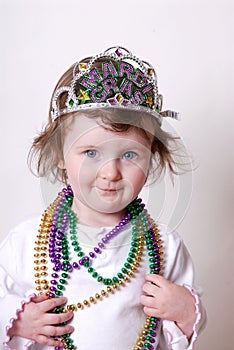 Toddler Celebrating Mardi Gras