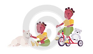 Toddler child, black little girl with cat pet, riding tricycle