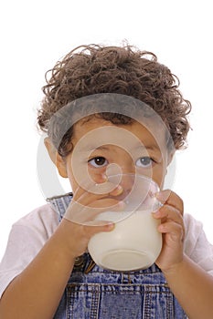 Toddler drinking milk upclose