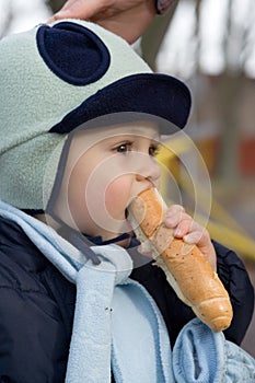 Toddler Eating Bread