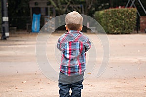 Toddler Facing Away From the Camera Outside