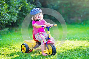 Toddler girl on a bike