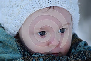 Toddler girl with bright blue eyes