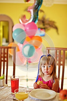 Toddler girl in cafe