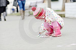 Toddler girl with chalk