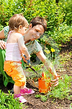 Toddler girl in garden