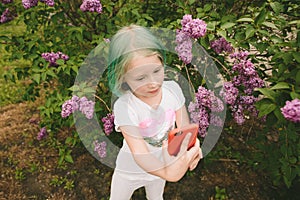 Toddler girl with green hair