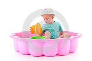 Toddler girl in swimming pool