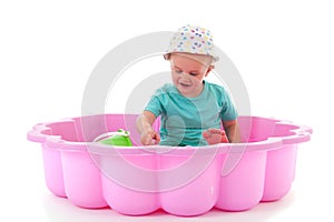 Toddler girl in swimming pool