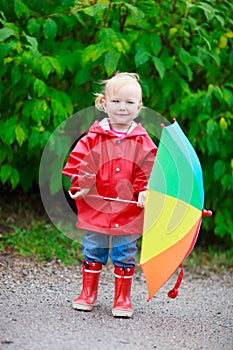 Toddler girl with umbrella