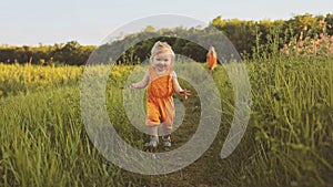 Toddler girl walking outdoor with mother family vacations