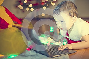 Toddler googling for santa claus