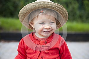 Toddler with hand , foot and mouth disease, outdoors.