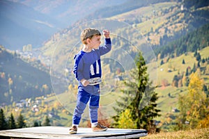 Toddler. Happy child outdoor. Smiling blond boy