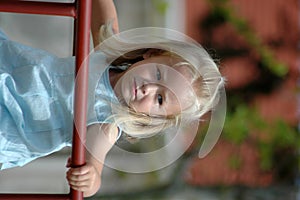 Toddler on jungle gym