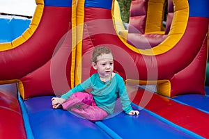 Toddler kid stopped in the game of bounce