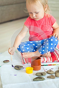 toddler paints with gouache