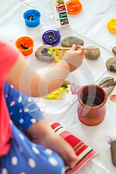 toddler paints with gouache