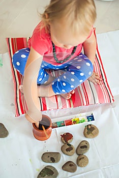 toddler paints with gouache