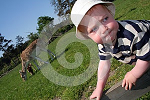 Toddler playing in countryside