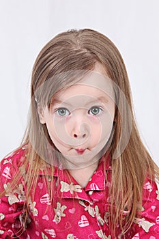 Toddler pulling funny face