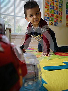 Toddler reading, playing and learning at home the ABC book