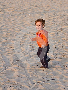 Toddler running beach