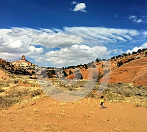 Toddler running in desert
