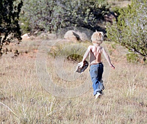 Toddler running outdoors