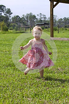 Toddler running outdoors