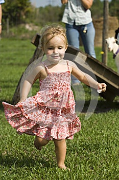 Toddler running outdoors