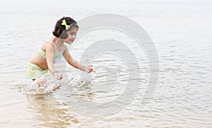 Toddler splashing water
