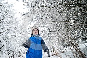 toddler in winter, much of snow